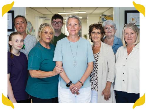 Group of community program team members standing together